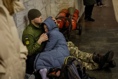 People shelter inside a subway station during a Russian missile attack on Kyiv.
