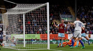 Long reacts after scoring an own goal.