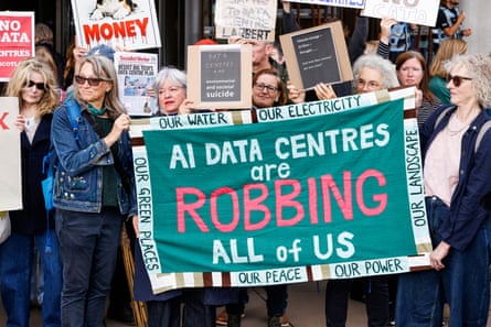 People gather outside Holyrood in Edinburgh to protest against AI datacentres.