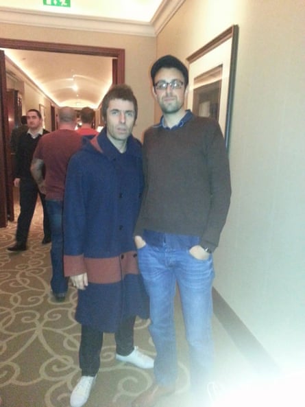 Steven Dunne and Liam Gallagher in a corridor