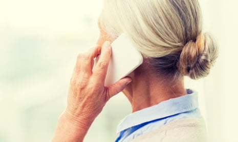 close up of senior woman calling on smartphone