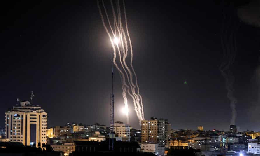 Rockets are launched towards Israel from Gaza City.