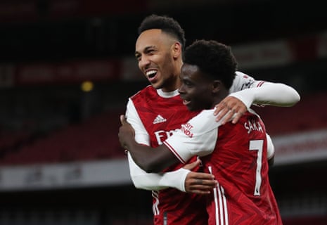 The two Arsenal goal scorers celebrate Saka’s goal.