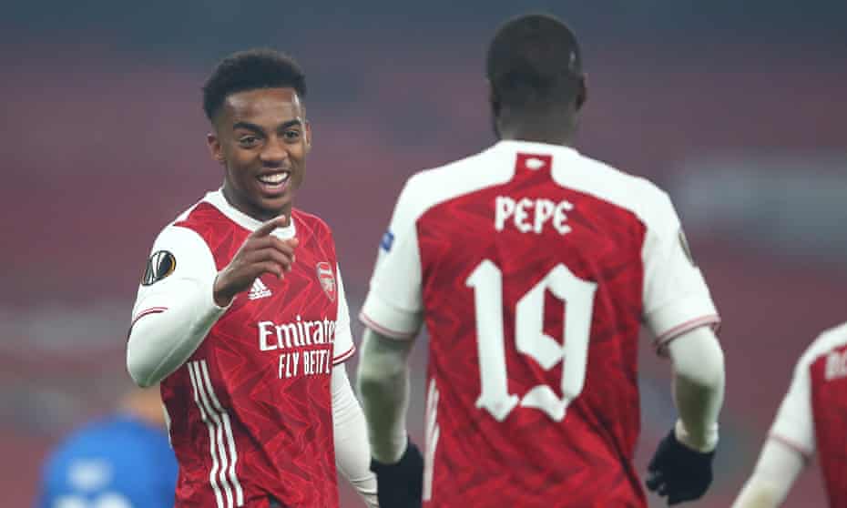 Joe Willock and Nicolas Pépé of Arsenal celebrate following their team’s second own goal of the night against Molde.