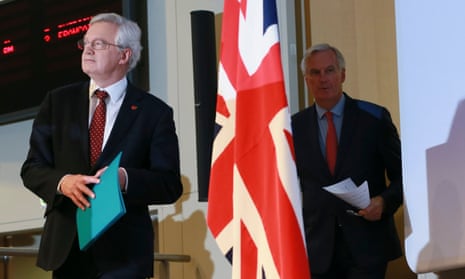 David Davis (left) and Michel Barnier arrive for the press conference.