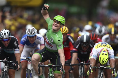 Andre Greipel celebrates as he crosses the finish line ahead of Cavendish and Sagan.