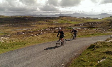 Two people road cycling in Ireland