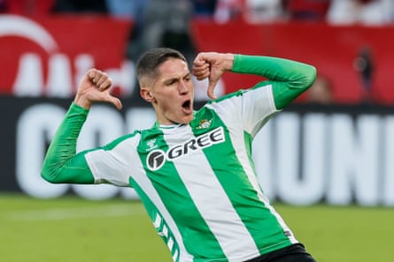 Sergi Altimira points to himself with two thumbs as he slides along the pitch after scoring