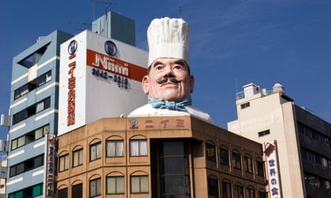 Large Chef s head on top of building in Kappabashi kitchenware district Tokyo Japan.