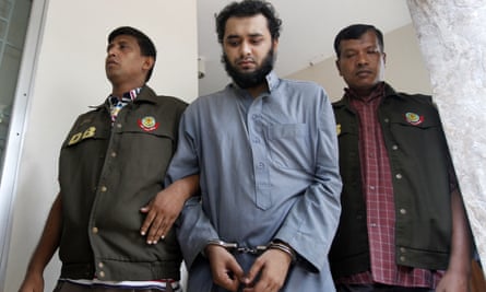 Samiun Rahman in handcuffs, flanked by police