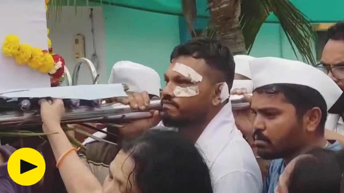 Sole India plane crash survivor mourns his brother during funeral – video