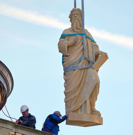A statue of the prophet Jeremiah being put into place on the palace last week