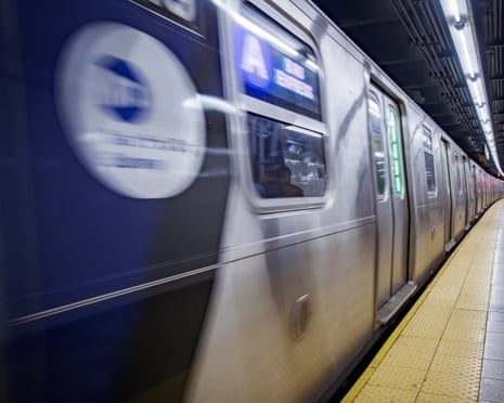 a train in motion in a subway station