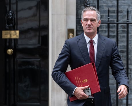 Workers in UK need to embrace AI or risk being left behind, minister says