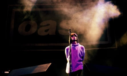 ‘There’s something totally pure about hearing 250,000 people joyfully scream along to Cigarettes & Alcohol’ … Liam Gallagher performing at Knebworth, 1996.