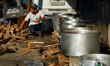 People cook on firewood