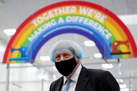 Britain’s prime minister Boris Johnson visits a PPE manufacturing facility on 13 February.