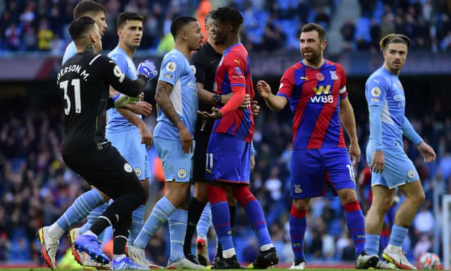 Manchester City and Palace players clash at half-time after Aymeric Laporte’s red card