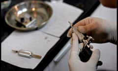 Tattooist Xing Haisong at work in his parlour