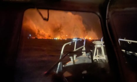 A handout photo made available by the United States Coast Guard (USCG) shows USCG crews responding from the ocean to the Lahaina wildfires in Maui, Hawaii, USA, 09 August 2023 (issued 11 August 2023). According to Coast Guard Station Maui, a total of 17 lives were saved from the water and 40 survivors were located ashore by boat crews.