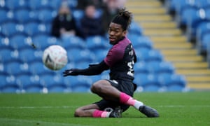 Peterborough United’s Ivan Toney scores their first goal.
