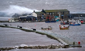 Waves crash against the Cobb in Lyme Regis, west Dorset. Picture: Andrew Matthews/PA Wire
