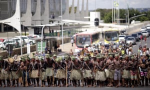 Brazilian Indians from various indigenous ethnic groups take part in a protest during a National Indigenous Mobilization in front of Planalto Palace in Brasilia<br>15 Apr 2015, Brasilia, Brazil --- Brazilian Indians from various indigenous ethnic groups take part in a protest during a National Indigenous Mobilization in front of Planalto Palace in Brasilia April 15, 2015. Organizers of the mobilization aim to discuss issues of land demarcation and indigenous rights with authorities. REUTERS/Ueslei Marcelino --- Image by © UESLEI MARCELINO/Reuters/Corbis