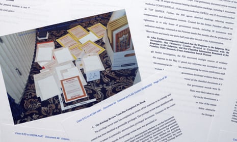 Pages from a Department of Justice court filing showing a photo of the seized documents, in response to Donald Trump’s request for a special master, in August 2022. 