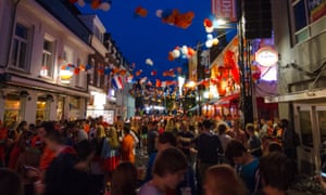 Revellers in Eindhoven’s Stratumseind celebrate King’s Day.
