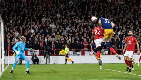 Newcastle Uniteds Elliot Anderson heads the ball into the net only for his effort to be disallowed for offside.