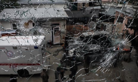 A bullet hole-riddled window at the scene of an attack at a hospital in Kabul, Afghanistan, earlier this year.