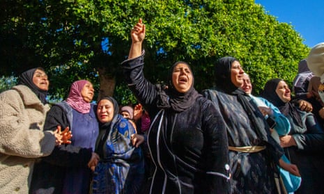 Palestinian women mourn during the funeral ceremony of Palestinian people who were killed by the Israeli army on 7 January