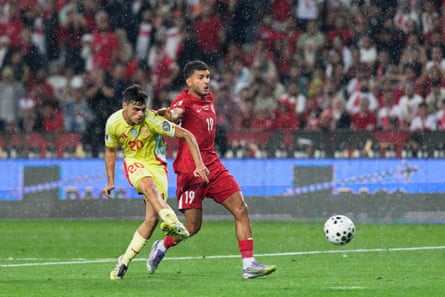 Pedri shoots for Spain.