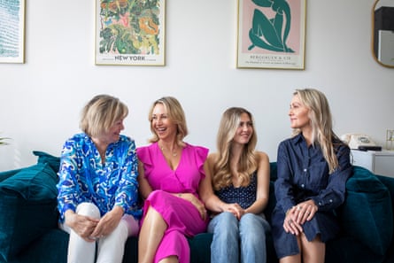 Sophie Blake, 52 sitting on a sofa with her mother Christine, daughter Maya and sister Lucy