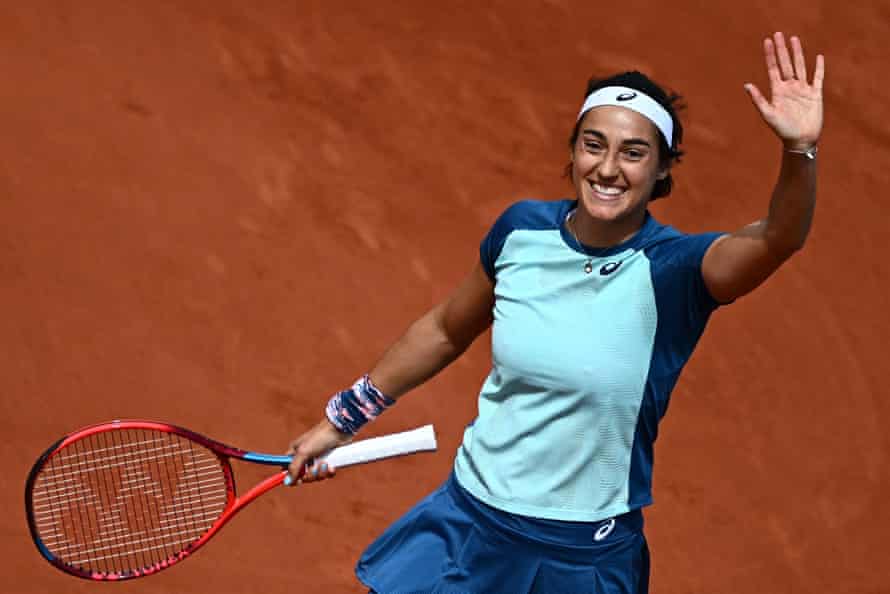 Caroline Garcia waves to the crowd.