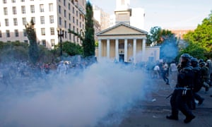 Police used teargas and rubber bullets to clear protesters from outside the White House.