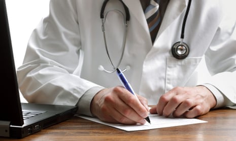 a doctor writing a prescription.