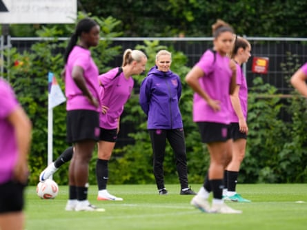 England head coach Sarina Wiegman runs the rule over her players in training on Monday
