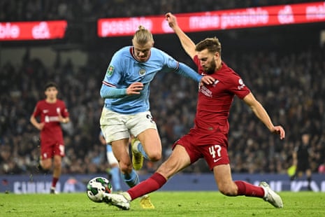 Nat Phillips perfectly takes the ball off the toe of Erling Haaland.