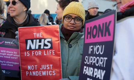 Nurses on a picket line outside St Thomas' Hospital in London.