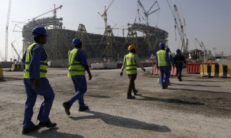 Workers at Lusail stadium, which hosts the World Cup final