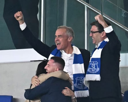The Canadian and British prime ministers, Mark Carney and Andy Burnham, celebrate Everton, the team they both support, scoring a goal in their 1-0 Carabao Cup third round win at home to Wolves at Hill Dickinson Stadium.