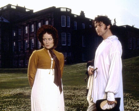She looks away coyly, he smoulders in a white nightie