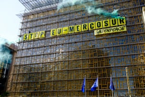Brussels, Belgium Greenpeace activists display a giant banner reading ‘Stop EU-Mercosur’ on the Europa building, the EU Council headquarters. The proposed trade deal with South American nations is ‘a disaster for nature, farmers and human rights’, Greenpeace says.