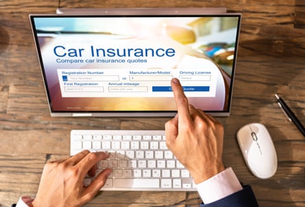 Man looking at car insurance website on a laptop