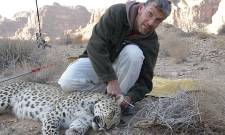 Homan Jowkar, one of the group imprisoned in Iran, with a Persian leopard. 