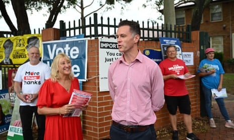 Labor leader Chris Minns joins local candidatre Kylie Wilkinson at the Panania Public School polling booth.