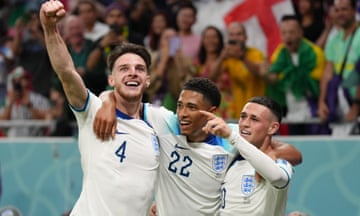 England's Phil Foden (right) celebrates scoring the at the 2022 World Cup with Jude Bellingham and Declan Rice