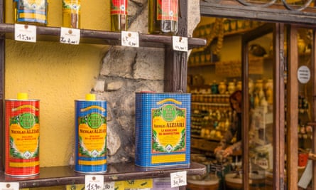 Olive oil in bottle and tins at Nicolas Alziari shop