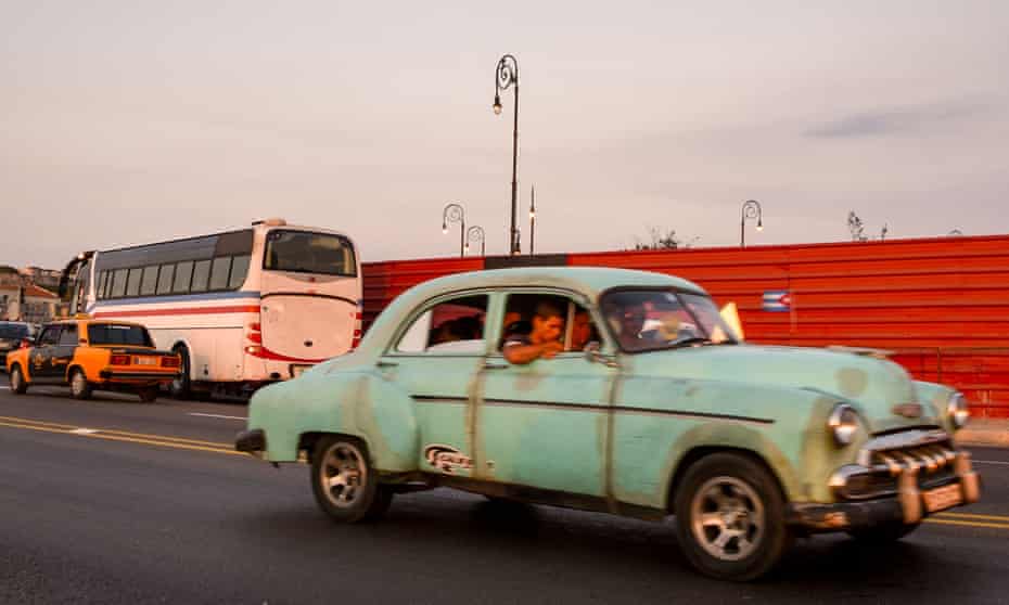Sharing a almendrón (collective taxi) in Cuba is a cheap and fun way of riding in a classic old American car.